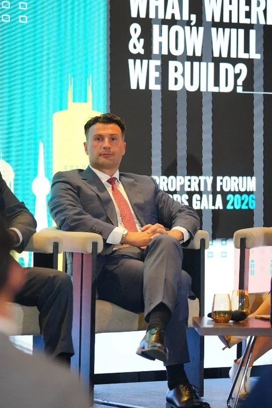 Vlad Musteață on stage during “The Next Residential Wave: What, Where & How Will We Build?” panel.